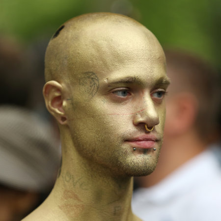 NEW YORK - JULY 9, 2016: Artists paint 100 fully nude models of all shapes and sizes during third NYC Body Painting Day in midtown Manhattan featuring artist Andy Golub in New Yorkのeditorial素材