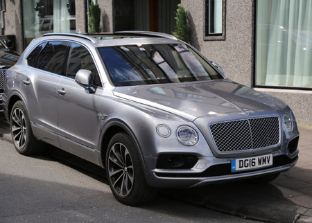 REYKJAVIK, ICELAND - JULY 3, 2016: Bentley luxury SUV Bentayga in Reykjavik, Iceland. The Bentley Bentayga is a four- or five-seat, five-door ultra-luxury SUV first produced by Bentley in 2015のeditorial素材