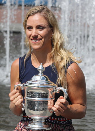 NEW YORK - SEPTEMBER 11, 2016:Two times Grand Slam champion Angelique Kerber of Germany posing with US Open trophy after her victory at US Open 2016 at Billie Jean King National Tennis Centerのeditorial素材