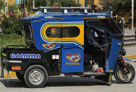 OLLANTAYTAMBO, PERU - OCTOBER 1, 2016: Auto rickshaw in the street of Ollantaytambo, Peru....