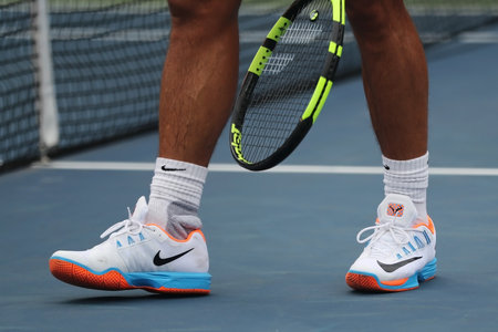 NEW YORK - SEPTEMBER 3, 2016: Grand Slam champion Rafael Nadal of Spain wears custom Nike tennis shoes during practice for US Open 2016 at Billie Jean King National Tennis Centerのeditorial素材