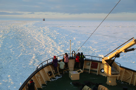 KEMI, FINLAND - FEBRUARY 18, 2017: Unidentified tourists aboard the arctic Icebreaker Sampo during unique cruise in frozen Baltic Sea.のeditorial素材