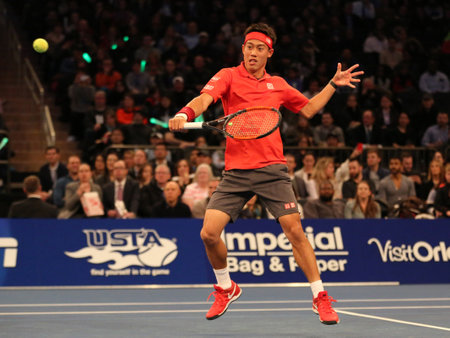 NEW YORK - MARCH 6, 2017: Professional tennis player Kei Nishikori of Japan in action during  BNP Paribas Showdown 10th Anniversary tennis event at Madison Square Garden in New Yorkのeditorial素材