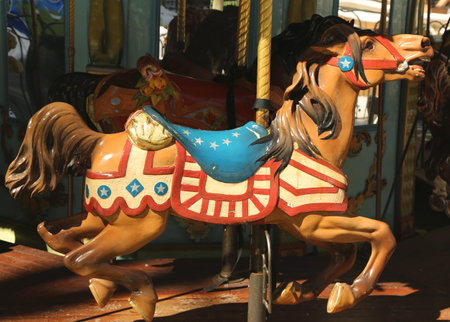 NEW YORK - MARCH 16, 2017:  Horses on a traditional fairground Le Carrousel in Bryant Park, Midtown Manhattanのeditorial素材