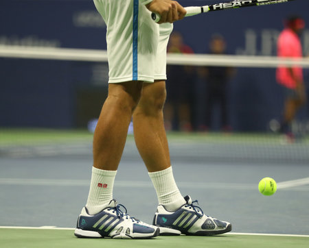 NEW YORK - SEPTEMBER 6, 2016: Grand Slam champion Novak Djokovic of Serbia wears custom Adidas tennis shoes during match at US Open 2016 at Billie Jean King National Tennis Center in New Yorkのeditorial素材