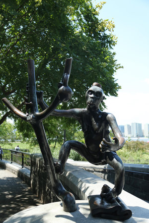 NEW YORK - AUGUST 6, 2013: Bronze sculptures at permanent public artwork The Real World created by American sculptor Tom Otterness located in Rockefeller Park at Battery Park City, Lower Manhattanのeditorial素材