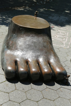 NEW YORK - AUGUST 6, 2013: Bronze sculptures at permanent public artwork The Real World created by American sculptor Tom Otterness located in Rockefeller Park at Battery Park City, Lower Manhattanのeditorial素材