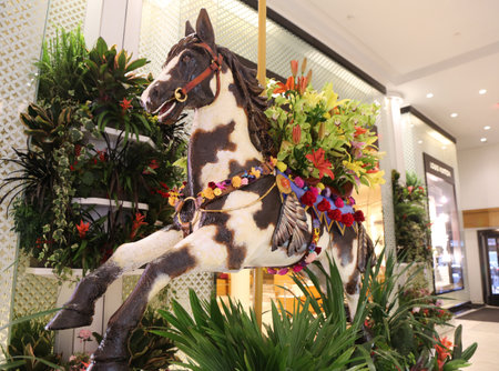 NEW YORK - APRIL 4, 2017: "Carnival" theme flower decoration during famous Macy's Annual Flower Show in the Macy's Herald Square in midtown Manhattanのeditorial素材