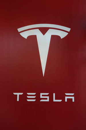 BROOKLYN, NEW YORK - MAY 21, 2017: Tesla Logo sign at the new Tesla dealership at Red Hook in...