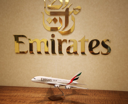 DUBAI, UAE - JANUARY 22, 2016: Emirates Airline logo on Airbus A380 plane at Dubai International Airportのeditorial素材