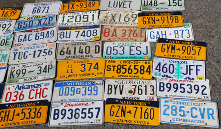 BROOKLYN, NEW YORK - AUGUST 13, 2017: Old car license plates at Brooklyn's largest flea market in...