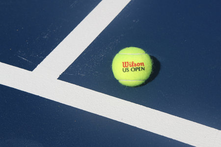 NEW YORK - AUGUST 23, 2017: US Open Wilson tennis ball at Billie Jean King National Tennis Center in New York. Wilson is the Official Ball of the US Open since 1979のeditorial素材