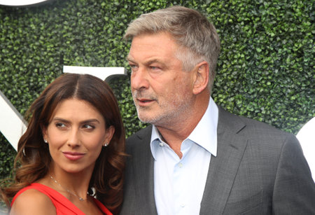 NEW YORK - AUGUST 28, 2017: American actor, producer, and comedian Alec Baldwin with his wife Hilaria Thomas on the blue carpet before US Open 2017 opening night ceremony at Tennis Center in New Yorkのeditorial素材