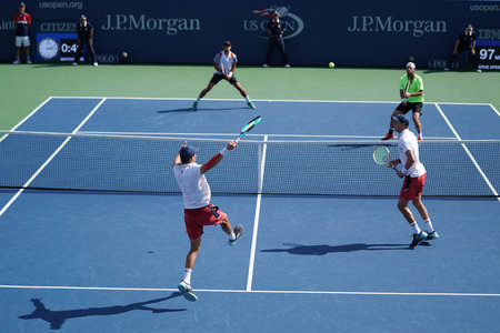 NEW YORK -SEPTEMBER 4, 2017: Grand Slam champions Mike and Bob Bryan of United states in action during US Open 2017 round 3 men's doubles match at Billie Jean King National Tennis Center in New Yorkのeditorial素材