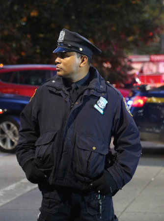 NEW YORK - OCTOBER 31, 2017: NYPD officer at the crime scene near a terror attack site in lower...