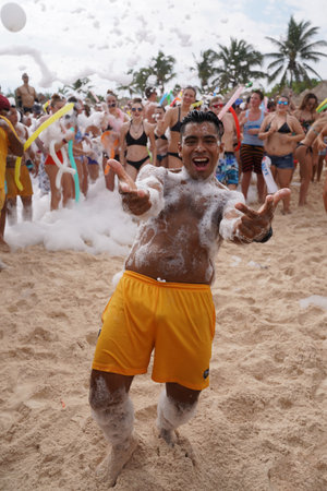 PLAYA DEL CARMEN, MEXICO - DECEMBER 31, 2017: Beach party at Iberostar Paraiso Maya Hotel at Playa Del Carmen in Mexico.のeditorial素材