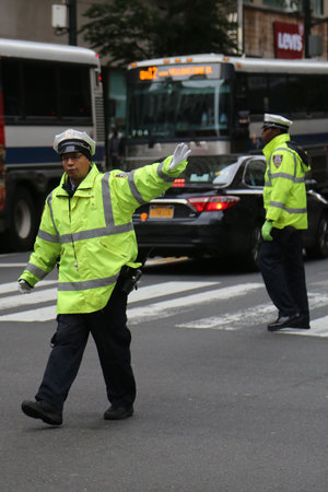 NEW YORK, JUNE 6, 2017: NYPD Traffic Control Police Officer in midtown Manhattanのeditorial素材
