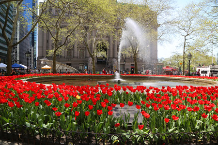 NEW YORK - MAY 3, 2018: Bowling Green public park in Financial district, Lower Manhattan. It is the oldest public park in New York City and is surrounded by its original 18th-century fenceのeditorial素材