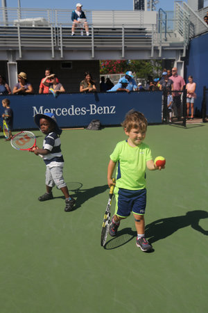 NEW YORK - AUGUST 26, 2017: Kids play mini tennis during 2017 Arthur Ashe Kids' Day at Billie Jean King National Tennis Center in New Yorkのeditorial素材
