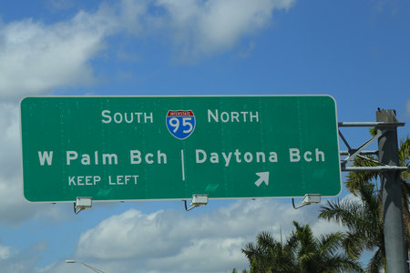 WEST PALM BEACH, FLORIDA  - MARCH 21, 2018: West Palm Beach and Daytona Beach exit signs on Interstate 95 in Floridaのeditorial素材