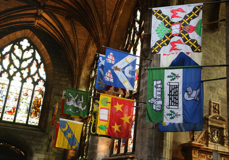 EDINBURGH, SCOTLAND - JULY 4, 2018: The heraldic banners of knights inside the St Giles' Cathedral in Edinburgh, Scotlandのeditorial素材