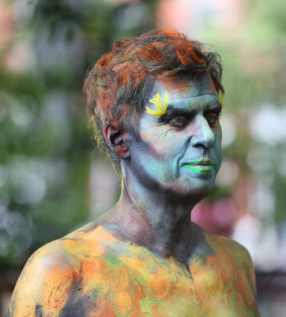 NEW YORK - JULY 14, 2018: Artists paint  fully nude models of all shapes and sizes during 5th NYC Body Painting Day featuring artist Andy Golub on Washington Square in New Yorkのeditorial素材
