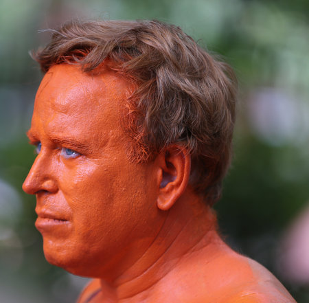 NEW YORK - JULY 14, 2018: Artists paint  fully nude models of all shapes and sizes during 5th NYC Body Painting Day featuring artist Andy Golub on Washington Square in New Yorkのeditorial素材