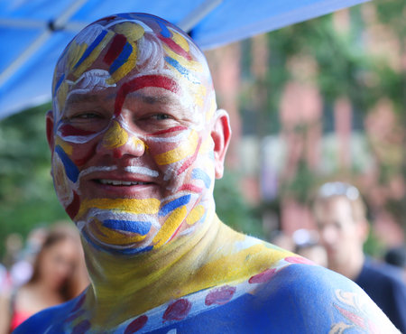 NEW YORK - JULY 14, 2018: Artists paint  fully nude models of all shapes and sizes during 5th NYC Body Painting Day featuring artist Andy Golub on Washington Square in New Yorkのeditorial素材