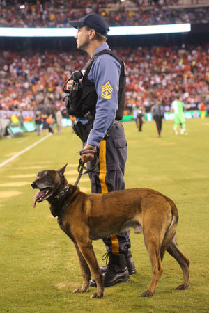 EAST RUTHERFORD, NJ - JULY 25, 2018: New Jersey State Police K-9 unit provides security during 2018 International Champions Cup game Manchester City vs Liverpool FC at MetLife stadiumのeditorial素材