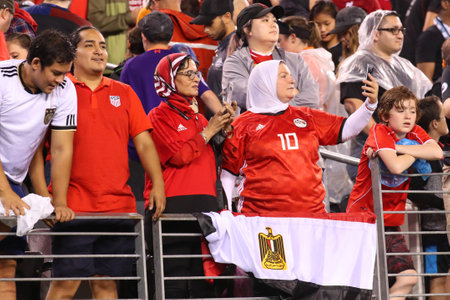 EAST RUTHERFORD, NJ - JULY 25, 2018: Egyptian soccer fans support Liverpool against Manchester City during 2018 International Champions Cup game at MetLife stadium. Liverpool won the match 2:1のeditorial素材