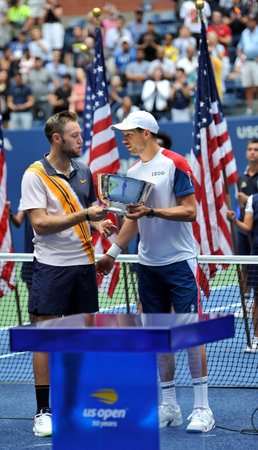 NEW YORK - SEPTEMBER 7, 2018: 2018 US Open men' doubles champions Jack Sock  (L) and Mike Brian of United States during trophy presentation at the Billie Jean King National Tennis Centerのeditorial素材