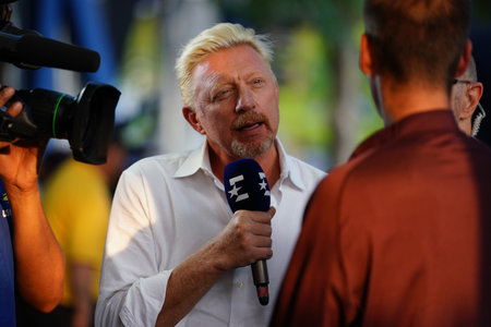 NEW YORK - AUGUST 27, 2018: Eurosport analyst Grand Slam Champion Boris Becker conducts interview during 2018 US Open at Billie Jean King National Tennis Center New Yorkのeditorial素材