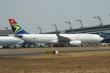 JOHANNESBURG, SOUTH AFRICA - SEPTEMBER 27, 2018: South African Airways  Airbus 330 on tarmac at O. R. Tambo International Airport in Johannesburg, South Africaのeditorial素材