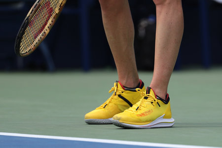 NEW YORK - AUGUST 27, 2018: Professional tennis player Elina Svitolina of Ukraine wears custom Nike tennis shoes during her first round match at the 2018 US Open at USTA National Tennis Centerのeditorial素材