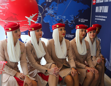 NEW YORK - SEPTEMBER 6, 2018: Emirates Airlines flight attendants at the Emirates Airlines booth during 2018 US Open at the Billie Jean King National Tennis Center in New Yorkのeditorial素材