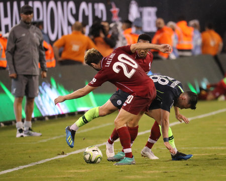 EAST RUTHERFORD, NJ - JULY 25, 2018: Adam Lallana #20 of Liverpool FC in action against Manchester City during 2018 International Champions Cup game at MetLife stadiumのeditorial素材
