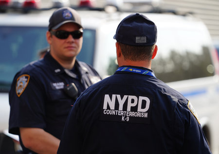 NEW YORK - AUGUST 27, 2018: NYPD counter terrorism  K-9 police officer provides security at National Tennis Center during 201U8 S Open in New Yorkのeditorial素材