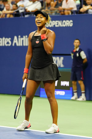 NEW YORK - SEPTEMBER 6, 2018: Professional tennis player Naomi Osaka in action during her 2018 US Open semi-final match at Billie Jean King National Tennis Centerのeditorial素材