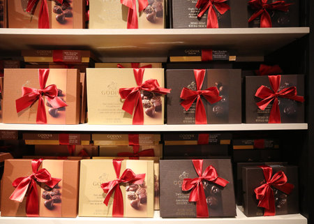 NEW YORK - DECEMBER 6, 2018: Chocolate boxes in Godiva store in Macy's Herald Square in Manhattan. Godiva Chocolatier is a manufacturer of premium chocolates founded in Belgium in 1926.のeditorial素材