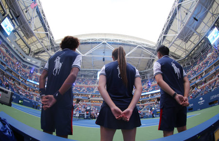 NEW YORK - SEPTEMBER 1, 2018: Ball girl and ball boys in action during 2018 US Open match at Billie...