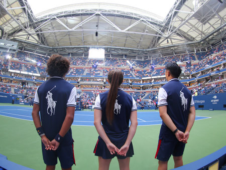 NEW YORK - SEPTEMBER 1, 2018: Ball girl and ball boys in action during 2018 US Open match at Billie Jean King National Tennis Center in New Yorkのeditorial素材