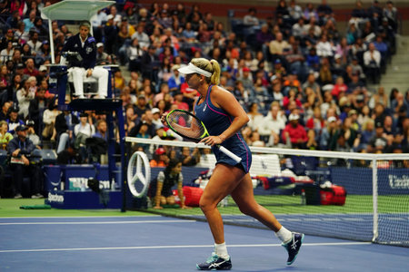 NEW YORK - SEPTEMBER 9, 2018: 2018 US Open women's doubles champion CoCo Vandeweghe of United States in action during final match at Billie Jean King National Tennis Centerのeditorial素材