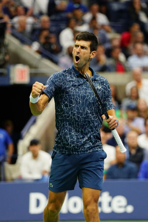 NEW YORK - SEPTEMBER 9, 2018: 2018 US Open Champion Novak Djokovic of Serbia in action during his final match against Juan Martin del Potro at USTA National Tennis Centerのeditorial素材