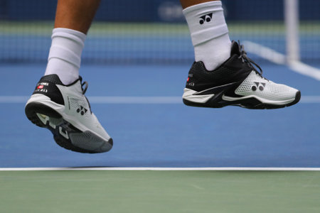 NEW YORK - AUGUST 27, 2018:  Grand Slam Champion Stanislas Wawrinka of Switzerland wears custom Yonex tennis shoes during first round match at 2018 US Open at USTA National Tennis Centerのeditorial素材