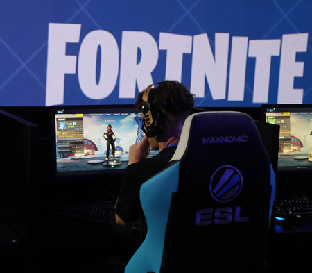 MELBOURNE, AUSTRALIA - JANUARY 27, 2019: Hundreds Fortnite gamers compete during Fortnite Summer Smash at Australian Open 2019 in Melbourne. Fortnite is an online video game developed by Epic Games and released in 2017のeditorial素材