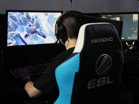 MELBOURNE, AUSTRALIA - JANUARY 27, 2019: Hundreds Fortnite gamers compete during Fortnite Summer Smash at Australian Open 2019 in Melbourne. Fortnite is an online video game developed by Epic Games and released in 2017のeditorial素材