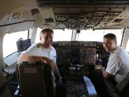 AUCKLAND, NEW ZEALAND - FEBRUARY 5, 2019: United Airlines pilots at cockpit before transpacific flight to San Francisco in Auckland International Airport, New Zealandのeditorial素材