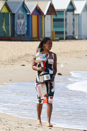 MELBOURNE, AUSTRALIA - JANUARY 27, 2019: 2 times Grand Slam Champion Naomi Osaka of Japan posing with Australian Open trophy at Brighton Beach in Melbourne after her victory at 2019 Australian Openのeditorial素材