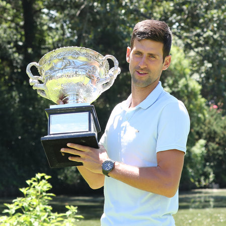 MELBOURNE, AUSTRALIA - JANUARY 28, 2019: 2019 Australian Open champion Novak Djokovic of Serbia posing with Australian Open trophy after his victory at Royal Botanic Gardens Victoria in Melbourneのeditorial素材