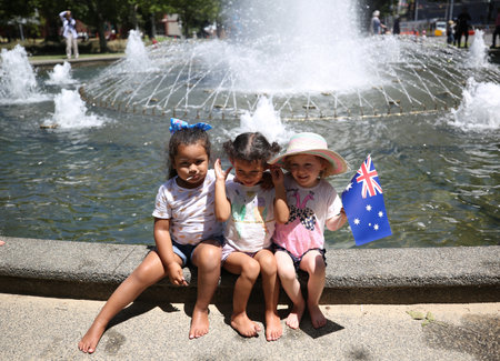 MELBOURNE, AUSTRALIA - JANUARY 26, 2019: Unidentified kids celebrate Australia on Australia Day next to Walker Fountain in Melbourneのeditorial素材